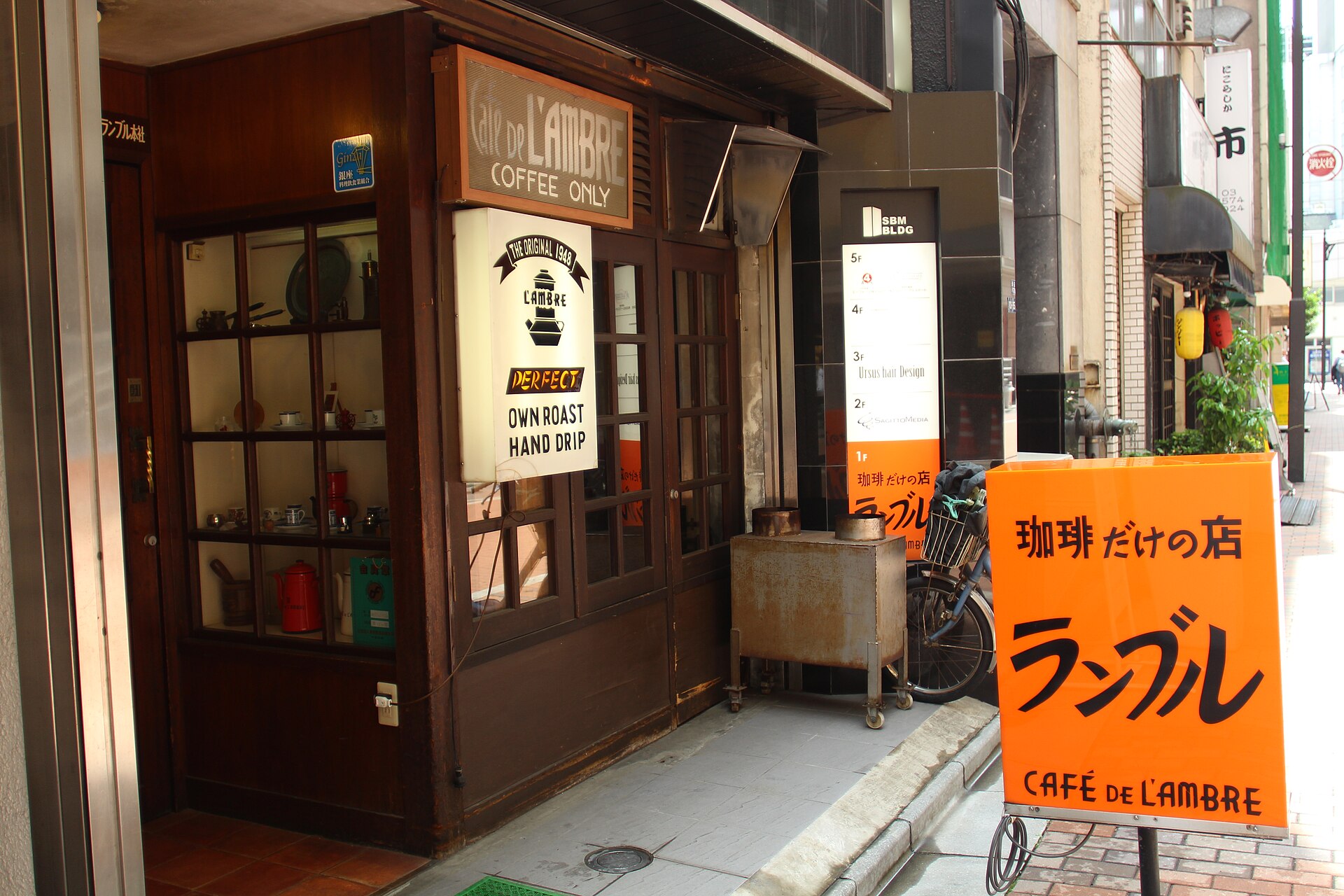 The tiny, dark wood interior of the old Café de l'Ambre coffee house in Tokyo