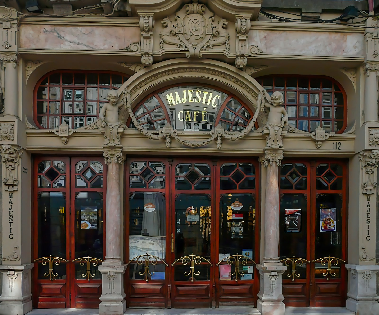 The ornate art nouveau entrance of Café Majestic in Porto