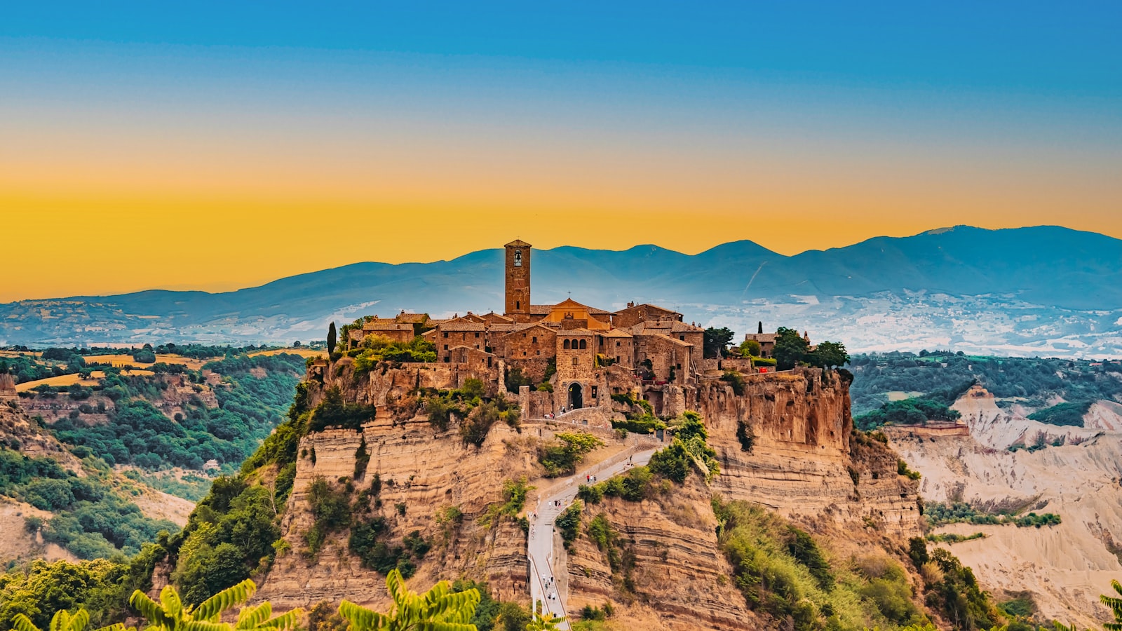 Civita di Bagnoregio on its eroding pinnacle, reached by a long footbridge