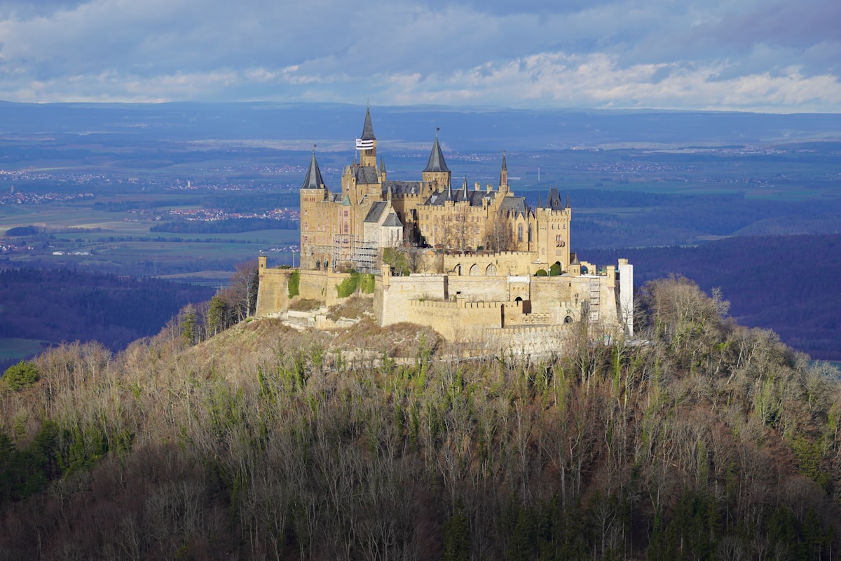 Hohenzollern Castle on its lone hilltop above wooded hills