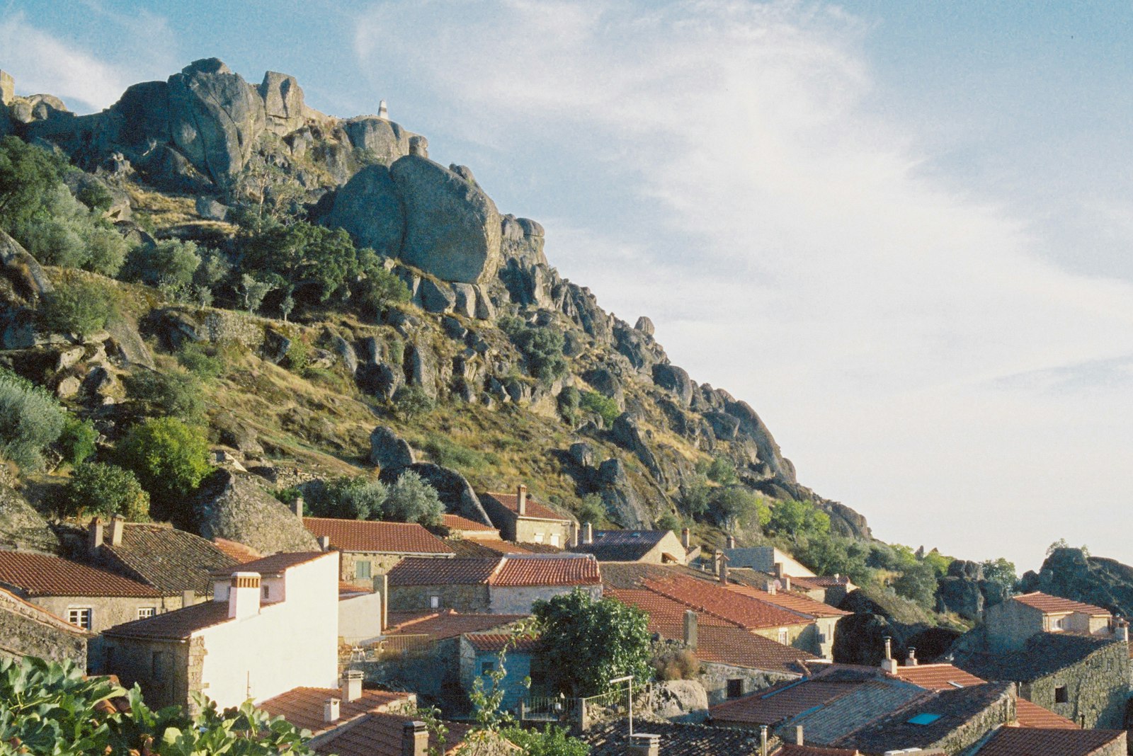 Stone houses of Monsanto built among and beneath enormous granite boulders