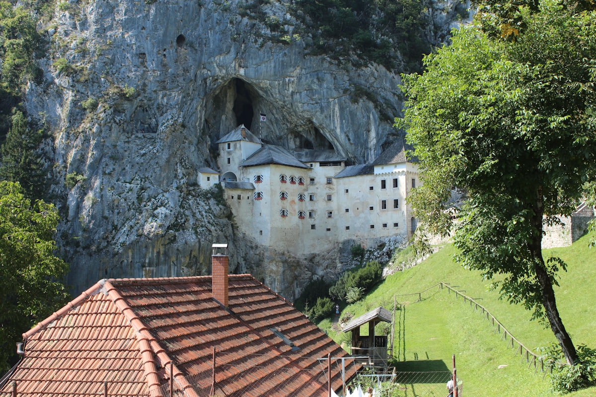 Predjama Castle built into the mouth of a cliff cave