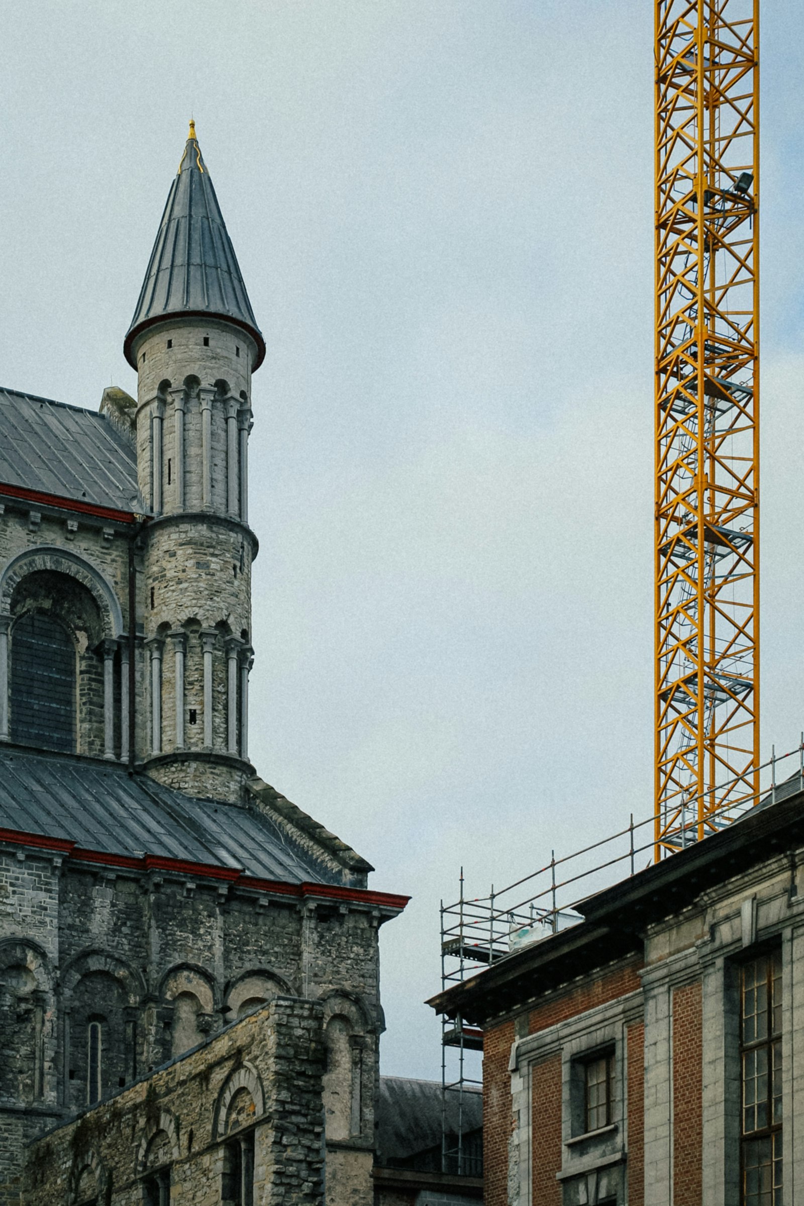 A historic tower rising over the old town of Tournai