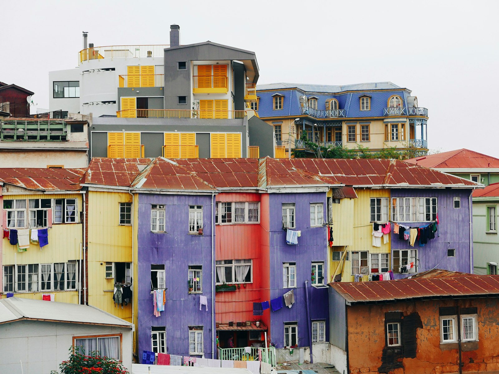 The colourful houses and mural-covered walls of Valparaíso climbing steep hills above the Pacific